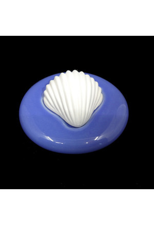 Duftstein Muschel auf blauem Unterteller